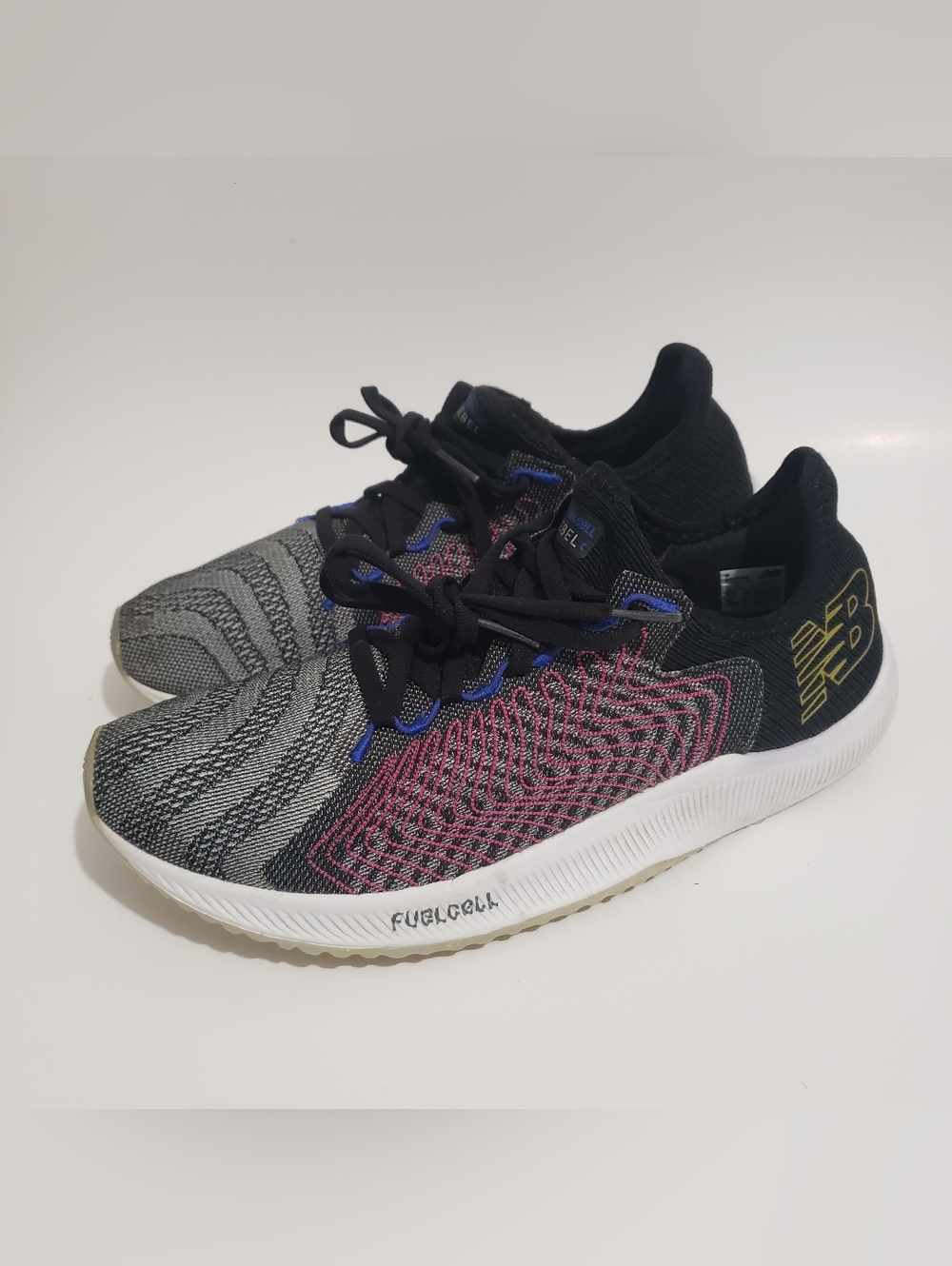 New Balance FuelCell Rebel women’s running shoes, size 9.5. Men’s size 8 well Ma